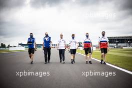Nikita Mazepin (RUS) Haas F1 Team walks the circuit with the team. 15.07.2021. Formula 1 World Championship, Rd 10, British Grand Prix, Silverstone, England, Preparation Day.