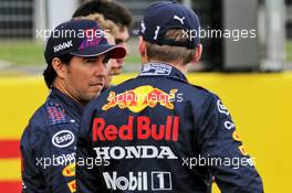 (L to R): Sergio Perez (MEX) Red Bull Racing and team mate Max Verstappen (NLD) Red Bull Racing - 2022 Car Launch. 15.07.2021. Formula 1 World Championship, Rd 10, British Grand Prix, Silverstone, England, Preparation Day.
