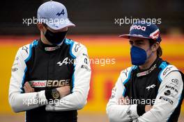 (L to R): Esteban Ocon (FRA) Alpine F1 Team and Fernando Alonso (ESP) Alpine F1 Team - 2022 Car Launch. 15.07.2021. Formula 1 World Championship, Rd 10, British Grand Prix, Silverstone, England, Preparation Day.