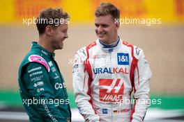 (L to R): Sebastian Vettel (GER) Aston Martin F1 Team and Mick Schumacher (GER) Haas F1 Team - 2022 Car Launch. 15.07.2021. Formula 1 World Championship, Rd 10, British Grand Prix, Silverstone, England, Preparation Day.