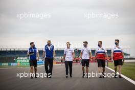 Nikita Mazepin (RUS) Haas F1 Team walks the circuit with the team. 15.07.2021. Formula 1 World Championship, Rd 10, British Grand Prix, Silverstone, England, Preparation Day.