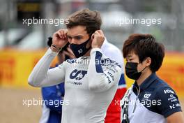 Pierre Gasly (FRA) AlphaTauri and Yuki Tsunoda (JPN) AlphaTauri - 2022 Car Launch. 15.07.2021. Formula 1 World Championship, Rd 10, British Grand Prix, Silverstone, England, Preparation Day.