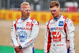 (L to R): Nikita Mazepin (RUS) Haas F1 Team and team mate Mick Schumacher (GER) Haas F1 Team - 2022 Car Launch. 15.07.2021. Formula 1 World Championship, Rd 10, British Grand Prix, Silverstone, England, Preparation Day.