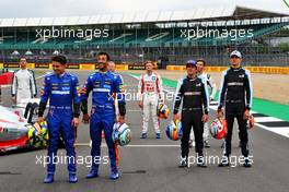(L to R): Lando Norris (GBR) McLaren and Daniel Ricciardo (AUS) McLaren; Fernando Alonso (ESP) Alpine F1 Team and Esteban Ocon (FRA) Alpine F1 Team - 2022 Car Launch. 15.07.2021. Formula 1 World Championship, Rd 10, British Grand Prix, Silverstone, England, Preparation Day.
