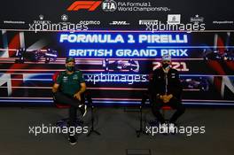 (L to R): Sebastian Vettel (GER) Aston Martin F1 Team and Esteban Ocon (FRA) Alpine F1 Team in the FIA Press Conference. 15.07.2021. Formula 1 World Championship, Rd 10, British Grand Prix, Silverstone, England, Preparation Day.