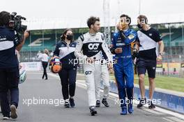 (L to R): Pierre Gasly (FRA) AlphaTauri and Daniel Ricciardo (AUS) McLaren - 2022 Car Launch. 15.07.2021. Formula 1 World Championship, Rd 10, British Grand Prix, Silverstone, England, Preparation Day.