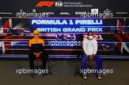 (L to R): Lando Norris (GBR) McLaren and Lewis Hamilton (GBR) Mercedes AMG F1 in the FIA Press Conference. 15.07.2021. Formula 1 World Championship, Rd 10, British Grand Prix, Silverstone, England, Preparation Day.