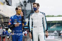 (L to R): Daniel Ricciardo (AUS) McLaren and George Russell (GBR) Williams Racing - 2022 Car Launch. 15.07.2021. Formula 1 World Championship, Rd 10, British Grand Prix, Silverstone, England, Preparation Day.