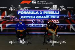 (L to R): Mick Schumacher (GER) Haas F1 Team and Sergio Perez (MEX) Red Bull Racing in the FIA Press Conference. 15.07.2021. Formula 1 World Championship, Rd 10, British Grand Prix, Silverstone, England, Preparation Day.