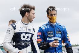 (L to R): Pierre Gasly (FRA) AlphaTauri and Daniel Ricciardo (AUS) McLaren - 2022 Car Launch. 15.07.2021. Formula 1 World Championship, Rd 10, British Grand Prix, Silverstone, England, Preparation Day.