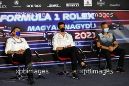 (L to R): Guenther Steiner (ITA) Haas F1 Team Prinicipal; Toto Wolff (GER) Mercedes AMG F1 Shareholder and Executive Director; and Mario Isola (ITA) Pirelli Racing Manager, in the FIA Press Conference. 30.07.2021. Formula 1 World Championship, Rd 11, Hungarian Grand Prix, Budapest, Hungary, Practice Day.