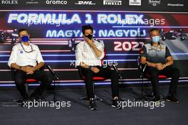 (L to R): Guenther Steiner (ITA) Haas F1 Team Prinicipal; Toto Wolff (GER) Mercedes AMG F1 Shareholder and Executive Director; and Mario Isola (ITA) Pirelli Racing Manager, in the FIA Press Conference. 30.07.2021. Formula 1 World Championship, Rd 11, Hungarian Grand Prix, Budapest, Hungary, Practice Day.