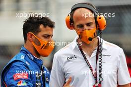 (L to R): Daniel Ricciardo (AUS) McLaren with Tom Stallard (GBR) McLaren Race Engineer on the grid. 01.08.2021. Formula 1 World Championship, Rd 11, Hungarian Grand Prix, Budapest, Hungary, Race Day.