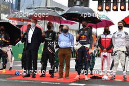 (L to R): Stefano Domenicali (ITA) Formula One President and CEO on the grid with Lewis Hamilton (GBR) Mercedes AMG F1, Jean Todt (FRA) FIA President, and Max Verstappen (NLD) Red Bull Racing. 01.08.2021. Formula 1 World Championship, Rd 11, Hungarian Grand Prix, Budapest, Hungary, Race Day.