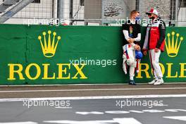 (L to R): Mick Schumacher (GER) Haas F1 Team and Kimi Raikkonen (FIN) Alfa Romeo Racing on the grid. 01.08.2021. Formula 1 World Championship, Rd 11, Hungarian Grand Prix, Budapest, Hungary, Race Day.