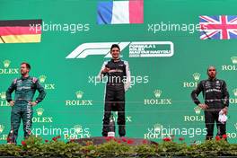 The podium (L to R): Sebastian Vettel (GER) Aston Martin F1 Team, second; Esteban Ocon (FRA) Alpine F1 Team, race winner; Lewis Hamilton (GBR) Mercedes AMG F1, third. 01.08.2021. Formula 1 World Championship, Rd 11, Hungarian Grand Prix, Budapest, Hungary, Race Day.