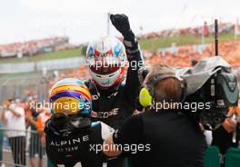 Race winner Esteban Ocon (FRA) Alpine F1 Team celebrates with team mate Fernando Alonso (ESP) Alpine F1 Team in parc ferme. 01.08.2021. Formula 1 World Championship, Rd 11, Hungarian Grand Prix, Budapest, Hungary, Race Day.