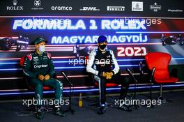 (L to R): Sebastian Vettel (GER) Aston Martin F1 Team and Esteban Ocon (FRA) Alpine F1 Team in the post race FIA Press Conference. 01.08.2021. Formula 1 World Championship, Rd 11, Hungarian Grand Prix, Budapest, Hungary, Race Day.