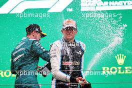 Race winner Esteban Ocon (FRA) Alpine F1 Team celebrates on the podium with second placed Sebastian Vettel (GER) Aston Martin F1 Team. 01.08.2021. Formula 1 World Championship, Rd 11, Hungarian Grand Prix, Budapest, Hungary, Race Day.