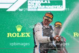 Race winner Esteban Ocon (FRA) Alpine F1 Team celebrates on the podium with second placed Sebastian Vettel (GER) Aston Martin F1 Team. 01.08.2021. Formula 1 World Championship, Rd 11, Hungarian Grand Prix, Budapest, Hungary, Race Day.
