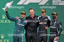 The podium (L to R): Sebastian Vettel (GER) Aston Martin F1 Team, second; Laurent Rossi (FRA) Alpine Chief Executive Officer; Esteban Ocon (FRA) Alpine F1 Team, race winner; Lewis Hamilton (GBR) Mercedes AMG F1, third. 01.08.2021. Formula 1 World Championship, Rd 11, Hungarian Grand Prix, Budapest, Hungary, Race Day.