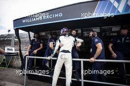 George Russell (GBR) Williams Racing celebrates ninth position with the team. 01.08.2021. Formula 1 World Championship, Rd 11, Hungarian Grand Prix, Budapest, Hungary, Race Day.