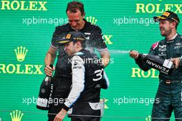 Race winner Esteban Ocon (FRA) Alpine F1 Team celebrates on the podium with Laurent Rossi (FRA) Alpine Chief Executive Officer and Sebastian Vettel (GER) Aston Martin F1 Team. 01.08.2021. Formula 1 World Championship, Rd 11, Hungarian Grand Prix, Budapest, Hungary, Race Day.
