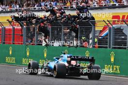 Fernando Alonso (ESP) Alpine F1 Team A521 passes his celebrating team at the end of the race. 01.08.2021. Formula 1 World Championship, Rd 11, Hungarian Grand Prix, Budapest, Hungary, Race Day.