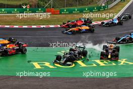 Valtteri Bottas (FIN) Mercedes AMG F1 W12 and Sergio Perez (MEX) Red Bull Racing RB16B crash at the start of the race. 01.08.2021. Formula 1 World Championship, Rd 11, Hungarian Grand Prix, Budapest, Hungary, Race Day.