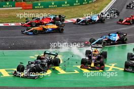 Valtteri Bottas (FIN) Mercedes AMG F1 W12 and Sergio Perez (MEX) Red Bull Racing RB16B crash out at the start of the race as Lance Stroll (CDN) Aston Martin F1 Team AMR21 crashes into Charles Leclerc (MON) Ferrari SF-21. 01.08.2021. Formula 1 World Championship, Rd 11, Hungarian Grand Prix, Budapest, Hungary, Race Day.