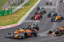 Lando Norris (GBR) McLaren MCL35M crashes into Max Verstappen (NLD) Red Bull Racing RB16B after being hit by Valtteri Bottas (FIN) Mercedes AMG F1 W12 at the start of the race. 01.08.2021. Formula 1 World Championship, Rd 11, Hungarian Grand Prix, Budapest, Hungary, Race Day.