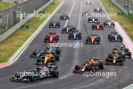Lewis Hamilton (GBR) Mercedes AMG F1 W12 leads at the start of the race as Valtteri Bottas (FIN) Mercedes AMG F1 W12 crashes into the back of Lando Norris (GBR) McLaren MCL35M. 01.08.2021. Formula 1 World Championship, Rd 11, Hungarian Grand Prix, Budapest, Hungary, Race Day.