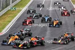 Lando Norris (GBR) McLaren MCL35M crashes into Max Verstappen (NLD) Red Bull Racing RB16B after being hit by Valtteri Bottas (FIN) Mercedes AMG F1 W12 at the start of the race. 01.08.2021. Formula 1 World Championship, Rd 11, Hungarian Grand Prix, Budapest, Hungary, Race Day.