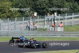 Lewis Hamilton (GBR) Mercedes AMG F1 W12 and Fernando Alonso (ESP) Alpine F1 Team A521 battle for position. 01.08.2021. Formula 1 World Championship, Rd 11, Hungarian Grand Prix, Budapest, Hungary, Race Day.