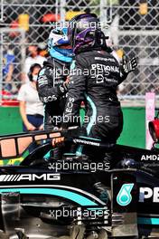 Lewis Hamilton (GBR) Mercedes AMG F1 W12 celebrates his pole position in qualifying parc ferme with second placed team mate Valtteri Bottas (FIN) Mercedes AMG F1. 31.07.2021. Formula 1 World Championship, Rd 11, Hungarian Grand Prix, Budapest, Hungary, Qualifying Day.
