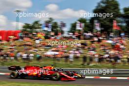 Max Verstappen (NLD) Red Bull Racing RB16B and Carlos Sainz Jr (ESP) Ferrari SF-21. 31.07.2021. Formula 1 World Championship, Rd 11, Hungarian Grand Prix, Budapest, Hungary, Qualifying Day.