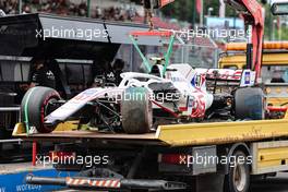 The damaged Haas VF-21 of Mick Schumacher (GER) Haas F1 Team is recovered back to the pits on the back of a truck. 31.07.2021. Formula 1 World Championship, Rd 11, Hungarian Grand Prix, Budapest, Hungary, Qualifying Day.