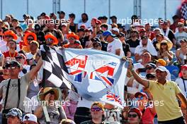 Circuit atmosphere - fans in the grandstand - flag for Lewis Hamilton (GBR) Mercedes AMG F1. 31.07.2021. Formula 1 World Championship, Rd 11, Hungarian Grand Prix, Budapest, Hungary, Qualifying Day.