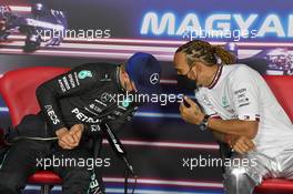 (L to R): Valtteri Bottas (FIN) Mercedes AMG F1 and Lewis Hamilton (GBR) Mercedes AMG F1 in the post qualifying FIA Press Conference. 31.07.2021. Formula 1 World Championship, Rd 11, Hungarian Grand Prix, Budapest, Hungary, Qualifying Day.