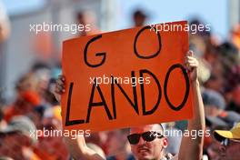 Circuit atmosphere - fans in the grandstand and a banner for Lando Norris (GBR) McLaren. 31.07.2021. Formula 1 World Championship, Rd 11, Hungarian Grand Prix, Budapest, Hungary, Qualifying Day.