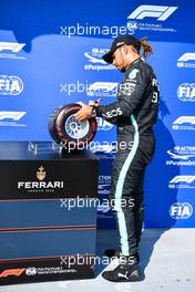 Lewis Hamilton (GBR) Mercedes AMG F1 with the Pirelli Pole Position Award in qualifying parc ferme. 31.07.2021. Formula 1 World Championship, Rd 11, Hungarian Grand Prix, Budapest, Hungary, Qualifying Day.