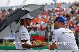 (L to R): Lewis Hamilton (GBR) Mercedes AMG F1 and team mate Valtteri Bottas (FIN) Mercedes AMG F1 on the drivers parade. 01.08.2021. Formula 1 World Championship, Rd 11, Hungarian Grand Prix, Budapest, Hungary, Race Day.