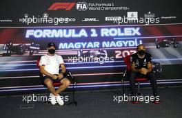 (L to R): Valtteri Bottas (FIN) Mercedes AMG F1 and Lewis Hamilton (GBR) Mercedes AMG F1 in the FIA Press Conference. 29.07.2021. Formula 1 World Championship, Rd 11, Hungarian Grand Prix, Budapest, Hungary, Preparation Day.