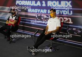 (L to R): Kimi Raikkonen (FIN) Alfa Romeo Racing and Daniel Ricciardo (AUS) McLaren in the FIA Press Conference. 29.07.2021. Formula 1 World Championship, Rd 11, Hungarian Grand Prix, Budapest, Hungary, Preparation Day.