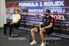 (L to R): lbop and Max Verstappen (NLD) Red Bull Racing in the FIA Press Conference. 29.07.2021. Formula 1 World Championship, Rd 11, Hungarian Grand Prix, Budapest, Hungary, Preparation Day.