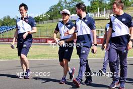 Yuki Tsunoda (JPN) AlphaTauri walks the circuit with the team. 29.07.2021. Formula 1 World Championship, Rd 11, Hungarian Grand Prix, Budapest, Hungary, Preparation Day.