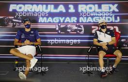 (L to R): George Russell (GBR) Williams Racing and Yuki Tsunoda (JPN) AlphaTauri in the FIA Press Conference. 29.07.2021. Formula 1 World Championship, Rd 11, Hungarian Grand Prix, Budapest, Hungary, Preparation Day.
