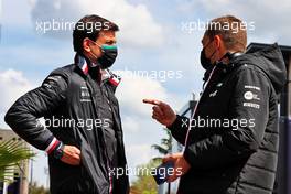 (L to R): Toto Wolff (GER) Mercedes AMG F1 Shareholder and Executive Director with Laurent Rossi (FRA) Alpine Chief Executive Officer. 16.04.2021. Formula 1 World Championship, Rd 2, Emilia Romagna Grand Prix, Imola, Italy, Practice Day.