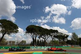Carlos Sainz Jr (ESP), Scuderia Ferrari and Lance Stroll (CDN), Aston Martin F1 Team  16.04.2021. Formula 1 World Championship, Rd 2, Emilia Romagna Grand Prix, Imola, Italy, Practice Day.