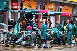 Sebastian Vettel (GER) Aston Martin F1 Team AMR21 in the pits before the start of the race as repairs to his brakes were not completed on the grid in time. 18.04.2021. Formula 1 World Championship, Rd 2, Emilia Romagna Grand Prix, Imola, Italy, Race Day.